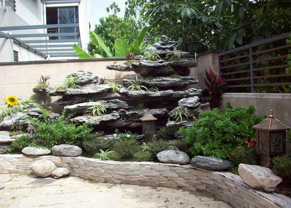 別墅花園設(shè)計(jì)中放置假山的作用